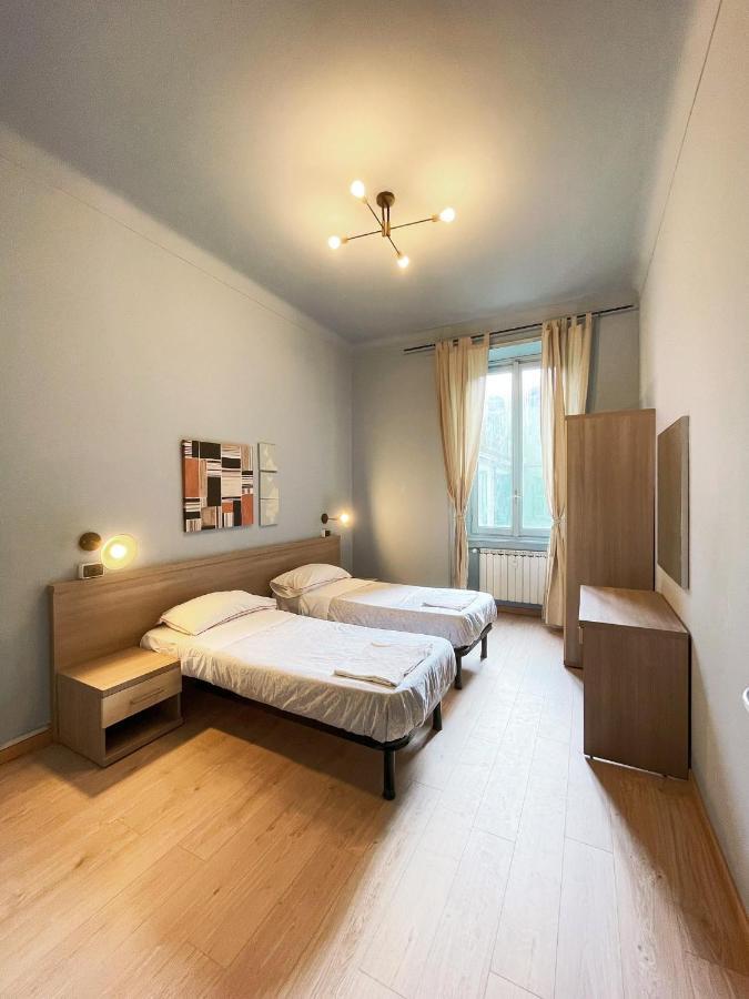 Camera Matrimoniale/Doppia con Letti Singoli con Bagno in Comune